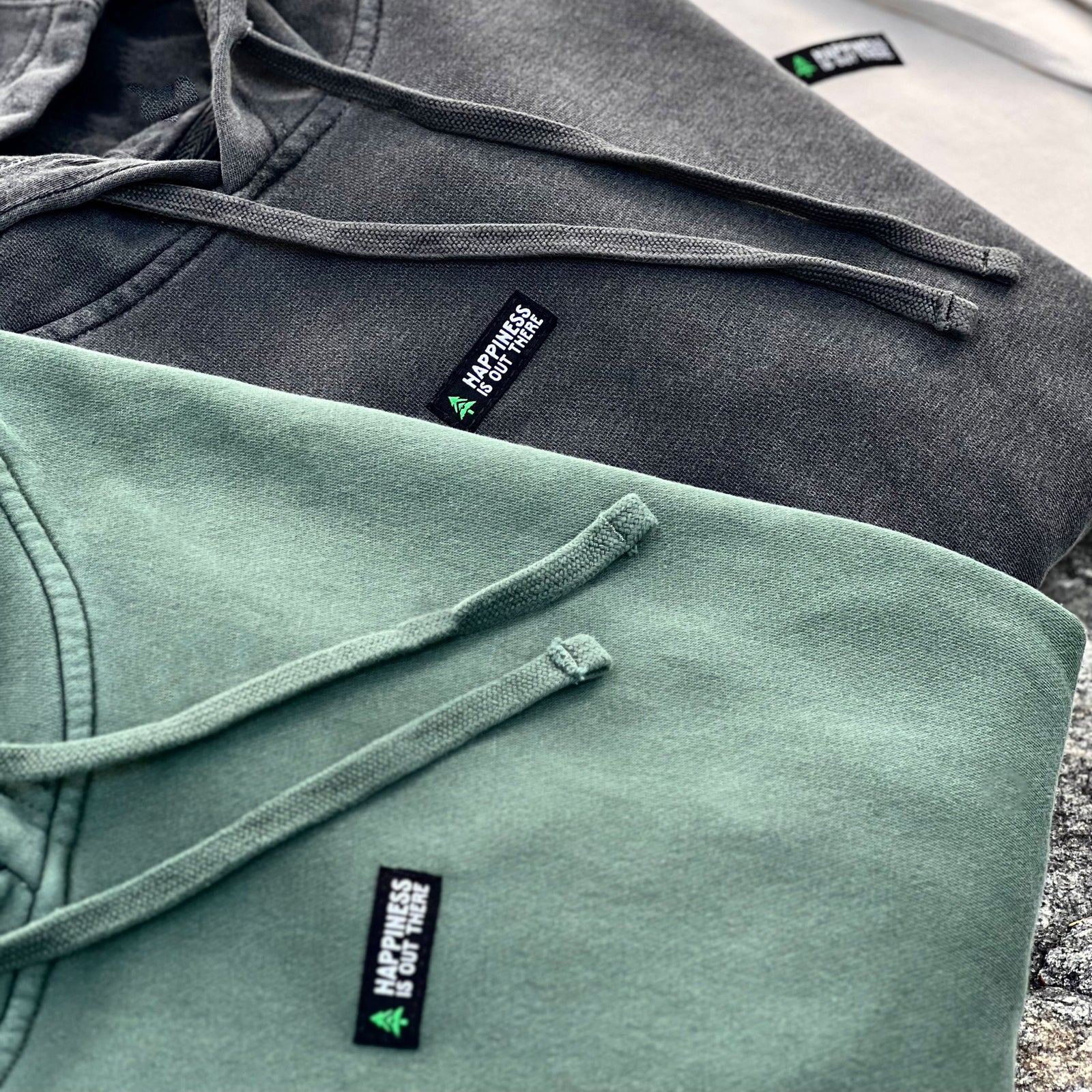 Nature-Dyed Unisex Hoodie w / Happiness Is Out There Label - The Happy Clothing Company