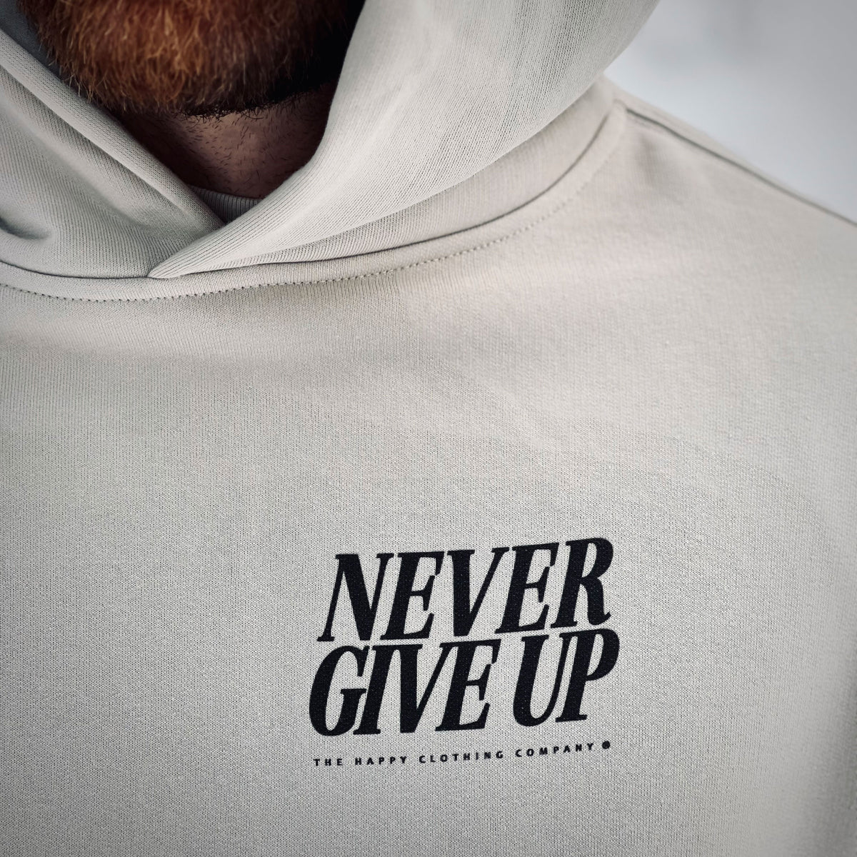 Never Give Up Unisex Relaxed Hoodie - The Happy Clothing Company