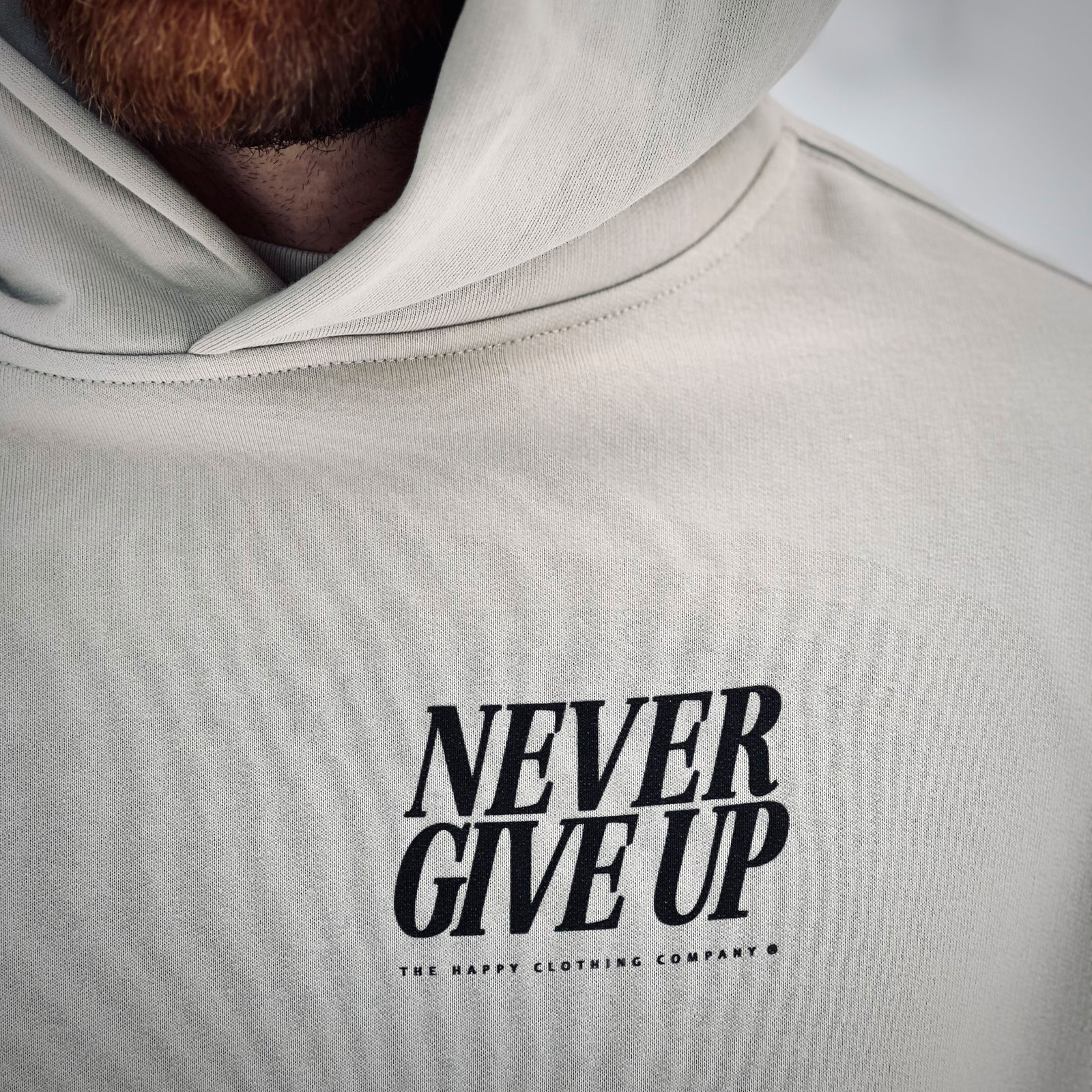 Never Give Up Unisex Relaxed Hoodie - The Happy Clothing Company