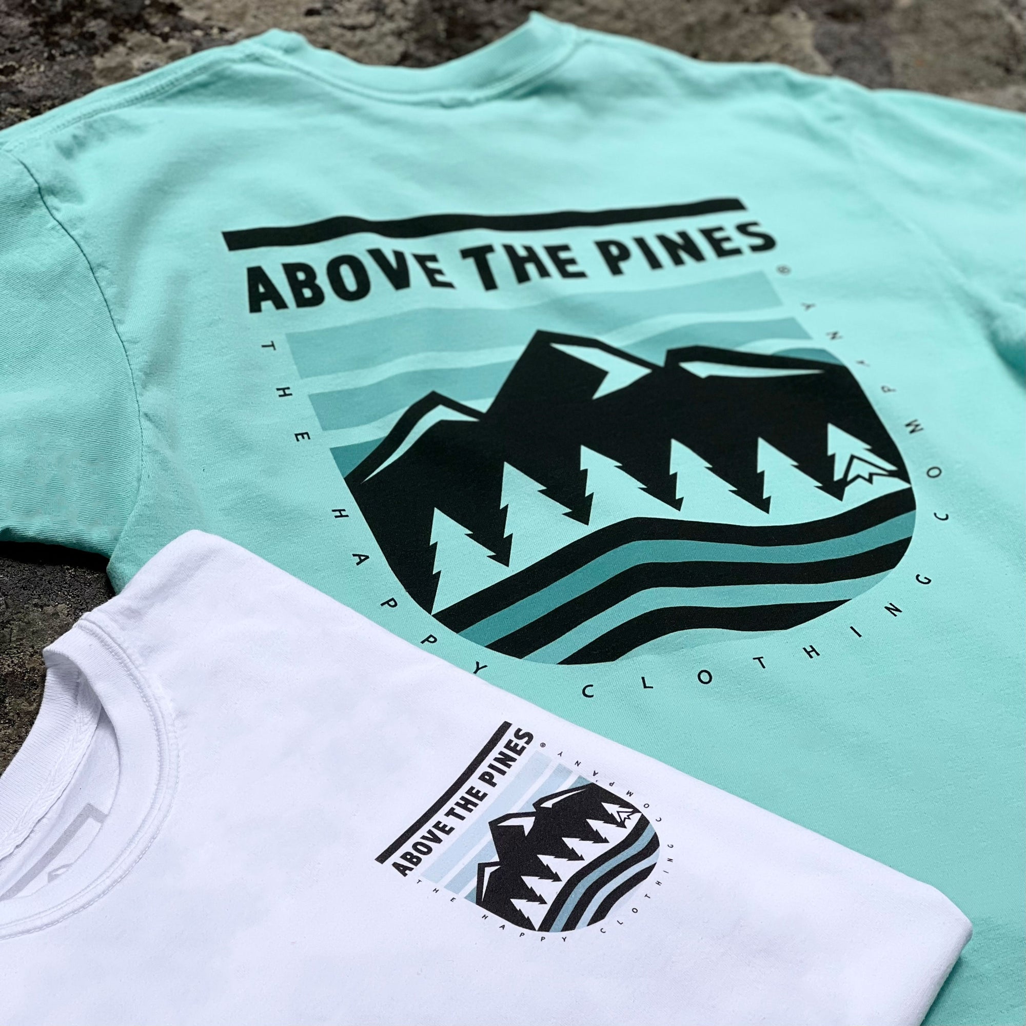 Above The Pines Back Print Nature-Inspired Pigment Dyed Tee - The Happy Clothing Company